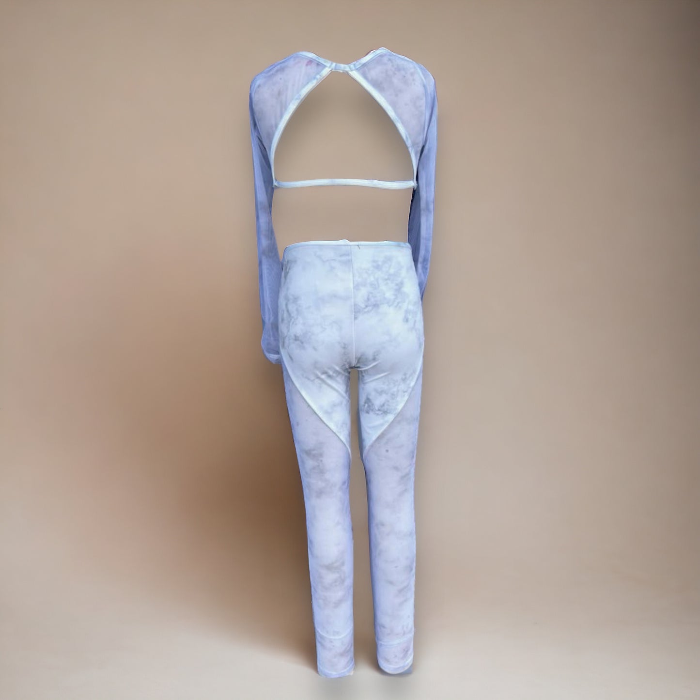 Sleek, sophisticated, and cool, this is one elegantly egdy look! Sleeves, high mesh cuts, an open back, a waist cutout that accentuates a waistline, and a fully lined deep v. Say hello to our Concrete Jumpsuit.