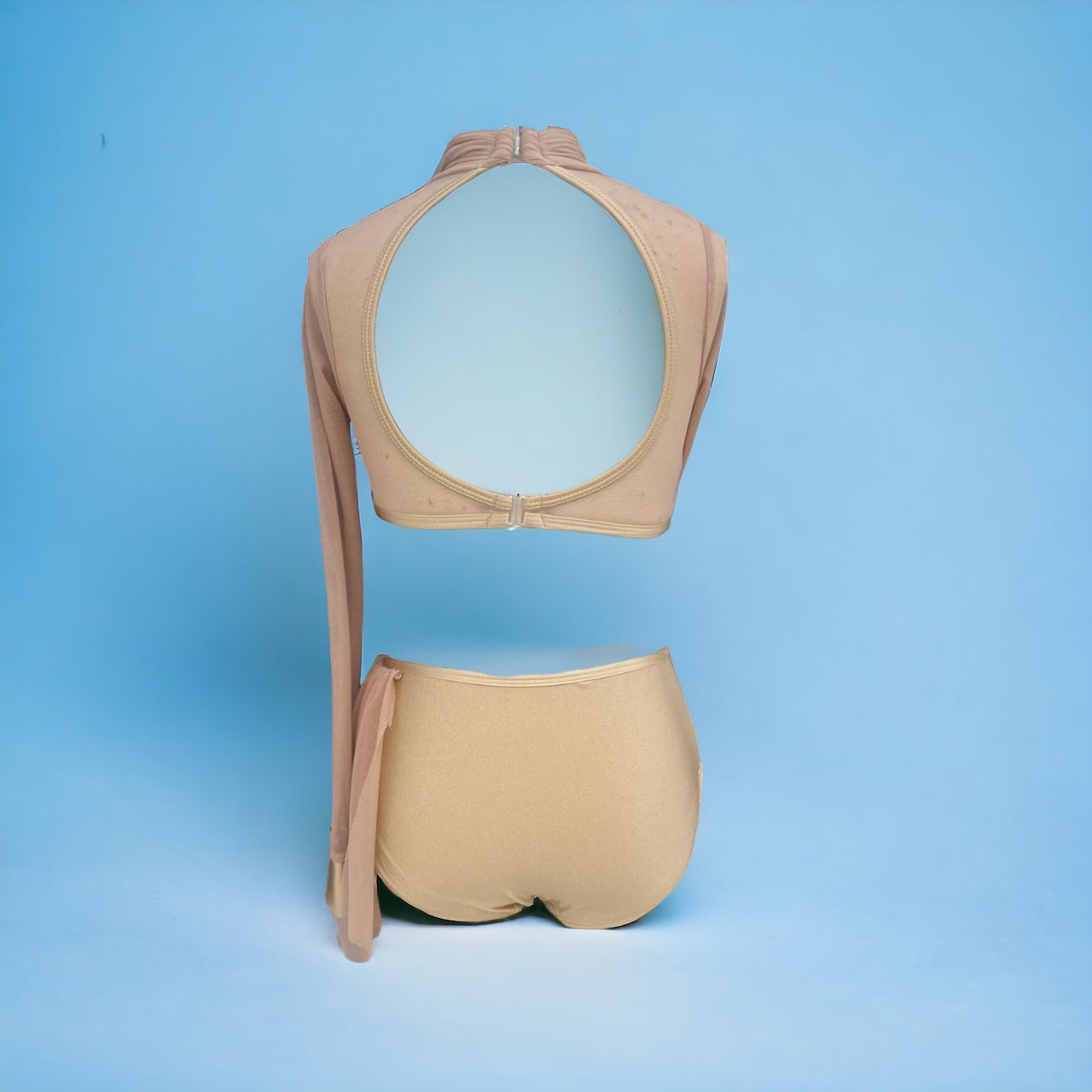 Step into the spotlight and own the stage with our fierce long sleeve high neck leotard! This show-stopping ensemble combines elegance and flair, featuring a chic side skirt that adds a touch of drama to your every movement. Unleash your inner powerhouse and let this stunning leotard elevate your dance performance to new heights of artistry and confidence.