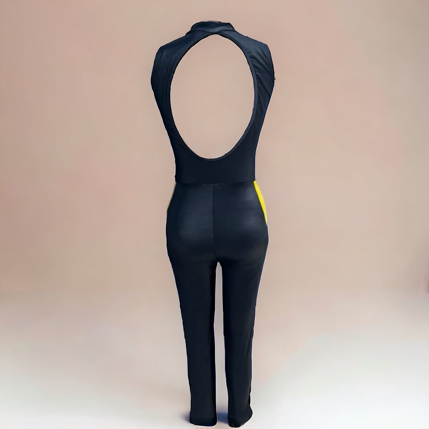 Wet look, sleek, and a touch of cool in a yellow zipper and bold stripe on the side of the leg. Our Milan Jumpsuit got a Kill Bill override. Question is... are you ready to rock it?