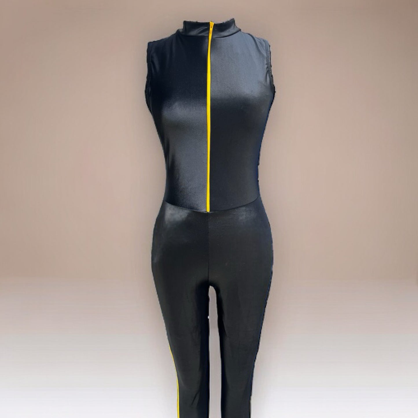 Wet look, sleek, and a touch of cool in a yellow zipper and bold stripe on the side of the leg. Our Milan Jumpsuit got a Kill Bill override. Question is... are you ready to rock it?