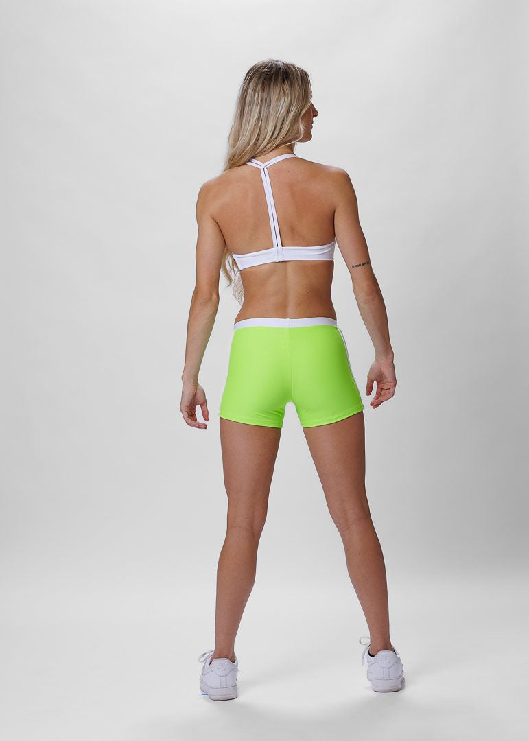 Get ready to dominate the dance floor in our vibrant neon green activewear Court shorts, inspired by the fast-paced world of tennis! Designed for fierce competitors, these shorts with sleek white accents will make you stand out with style and attitude. Step up your game and unleash your unstoppable energy in this winning ensemble by Opra Dancewear.
