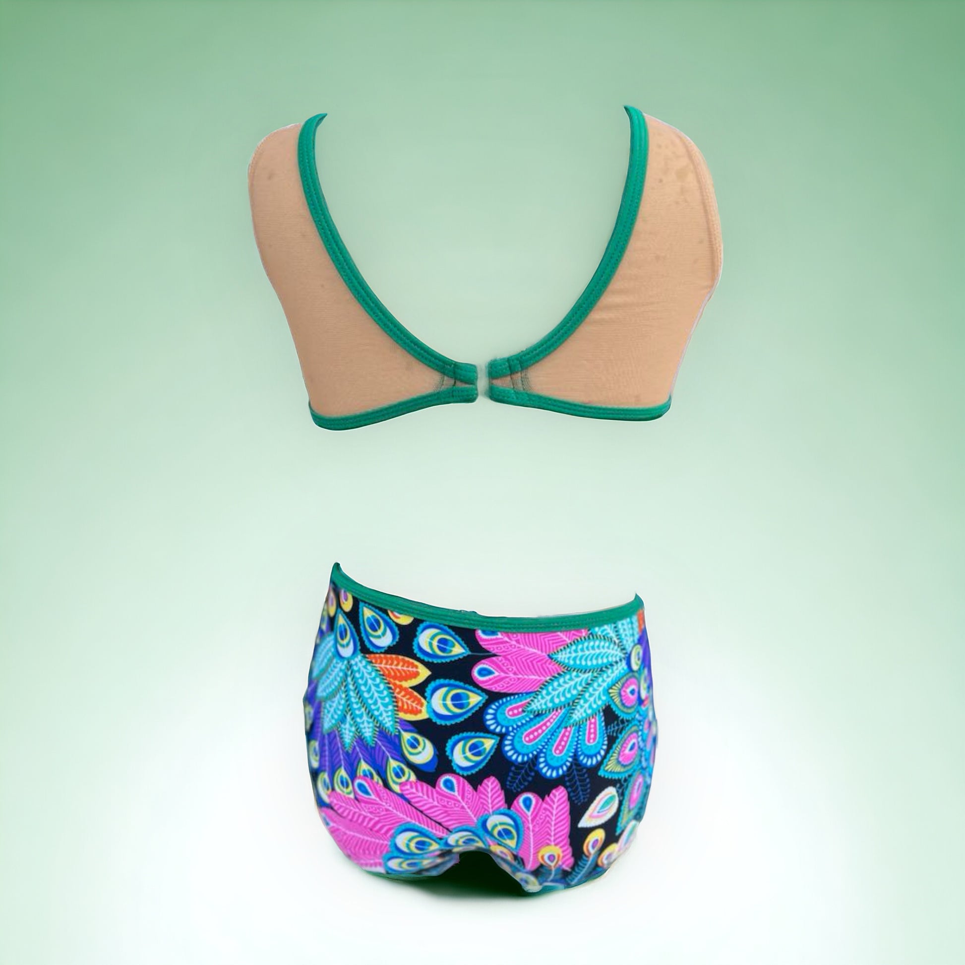 Gorgeous tropical paradise print with hues of yellows, greens, pinks, aquas, and blacks make a statement with our geometric cuts and strapwork in our Motion Leo. Only one... will it be yours?!