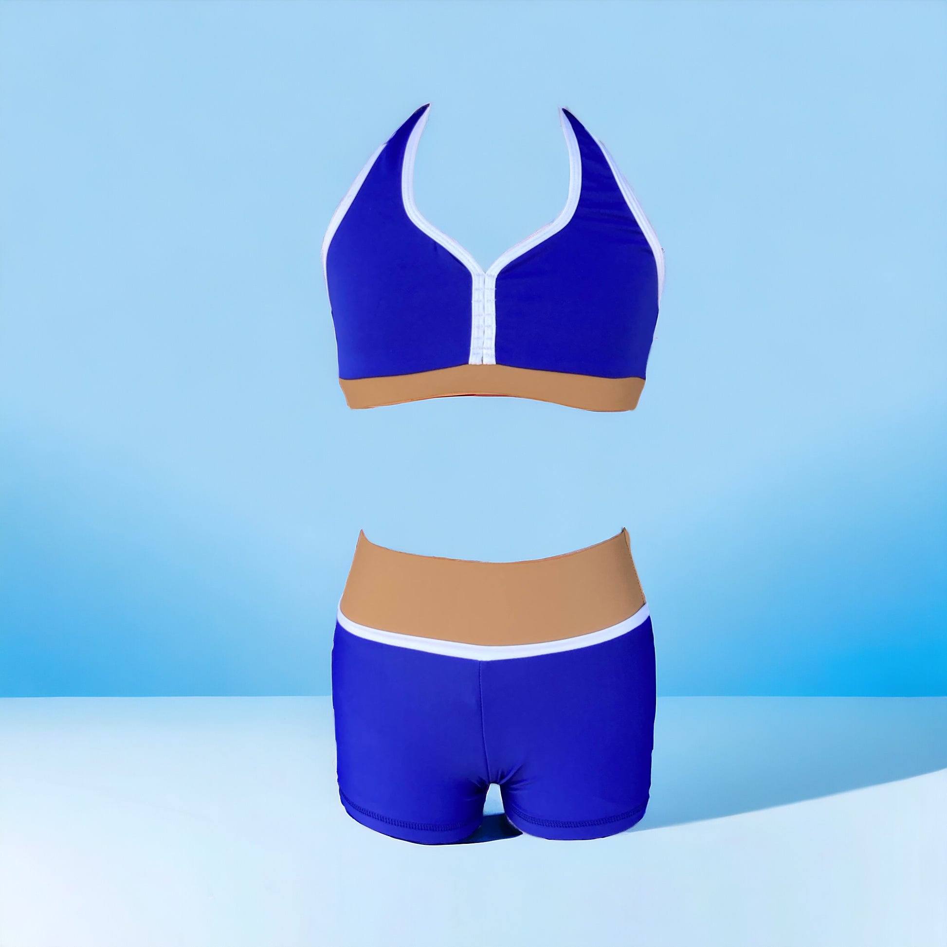Make a statement with the Amalfi Set from Opra Dancewear! Perfect for dance conventions and auditions, this vibrant set features a unique and sophisticated color block of royal blue, a pop of white, and a neutral cappucino. Stay standing out with this essential set.&nbsp;