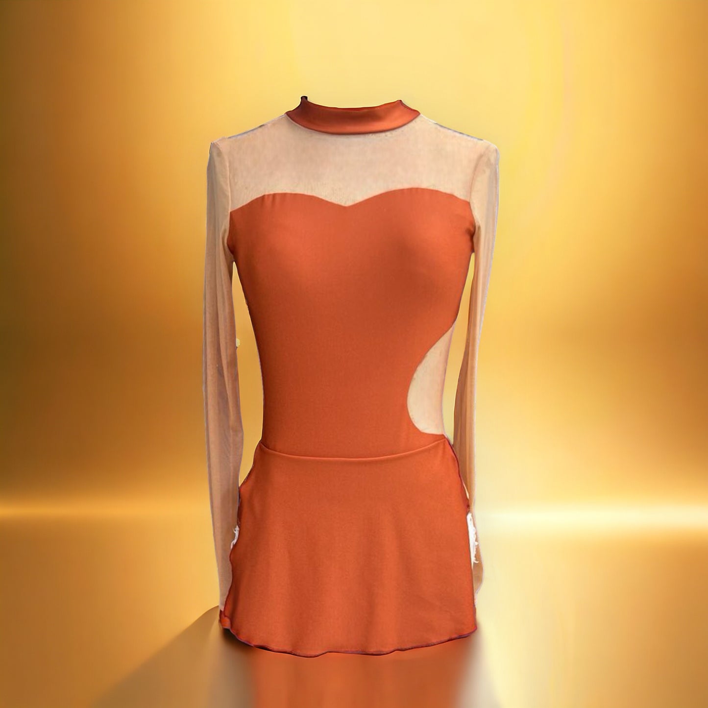 Introducing the Faith Costume Base. Designed with a high neck, long sleeves with a cuff, and a short skirt with high slits, this piece exudes elegance and luxury. Enhance your showstopping look with its unique shark bite and open back design. Versatile and sophisticated, this is a must-have for any costume collection.