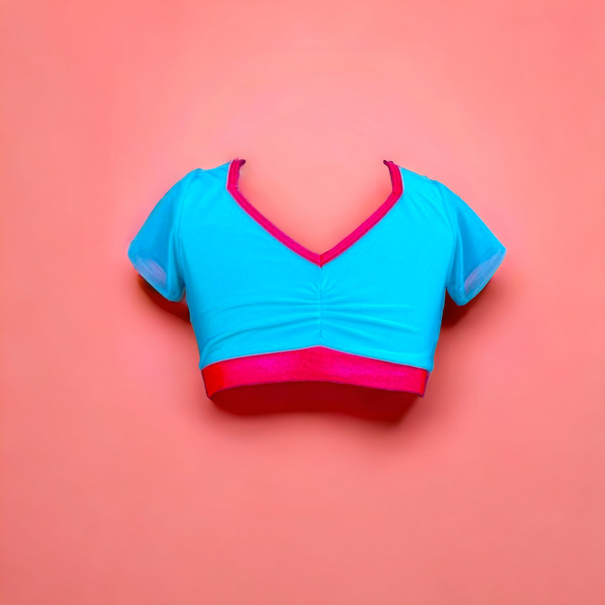 Turquoise top with coral trimming, mesh sleeves, and mesh back, all bringing you back to a retro feeling that is both bold and fun n true Opra fashion. Wear your confidence with Opra Dancewear